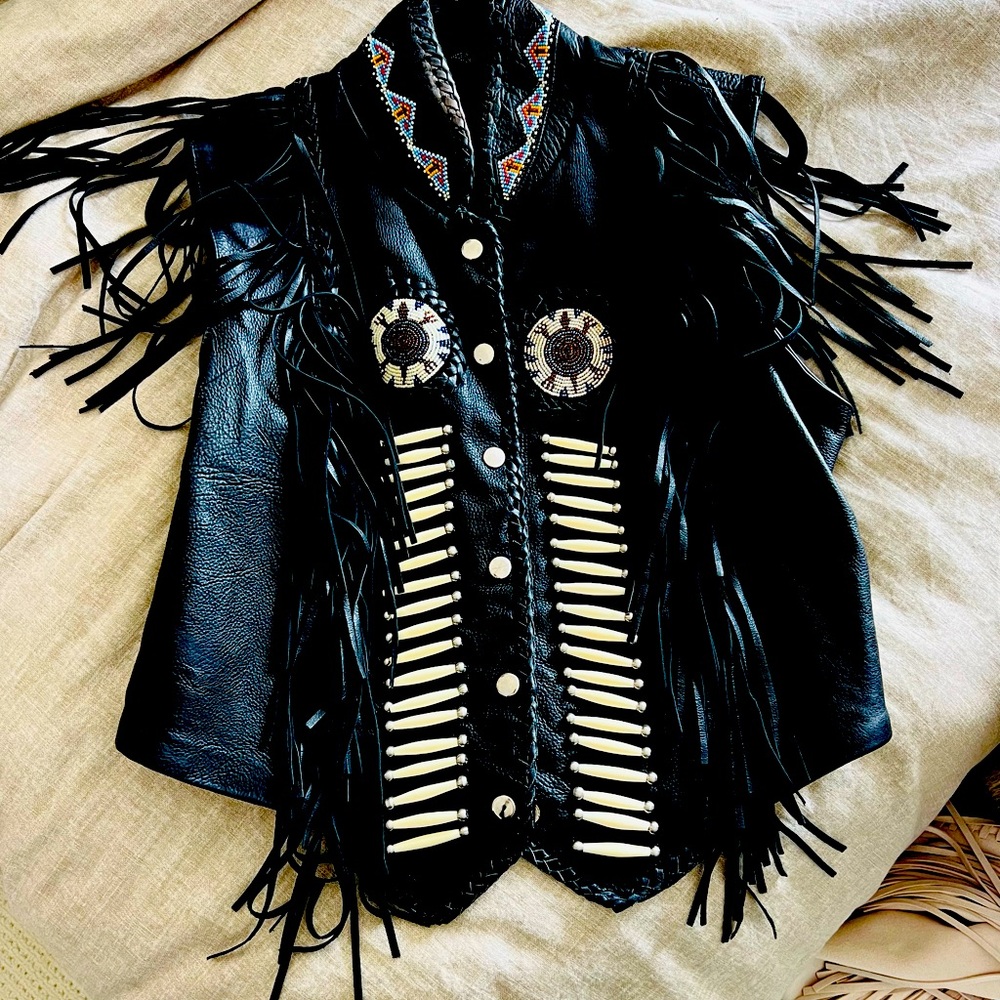 Black leather fringe vest w/ beaded details worn by Kiana Harley Davidson shoot